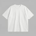 Yetişkinler için ekru renkli, premium loose fit kesim t-shirt mockup görseli. %100 pamuklu, heavyweight tok kumaşı ile formunu korur. Bu boş tasarım, özelleştirme sayfasında Option Set Preview aracıyla müşterilerin kendi 2 satırlık özel yazılarını (toplam 20 karakter) Alman nakış kalitesiyle t-shirt üzerine ekleyerek gerçeğe en yakın şekilde önizlemeleri için bir tabandır. Günlük konfor ve kişisel stil sunar.