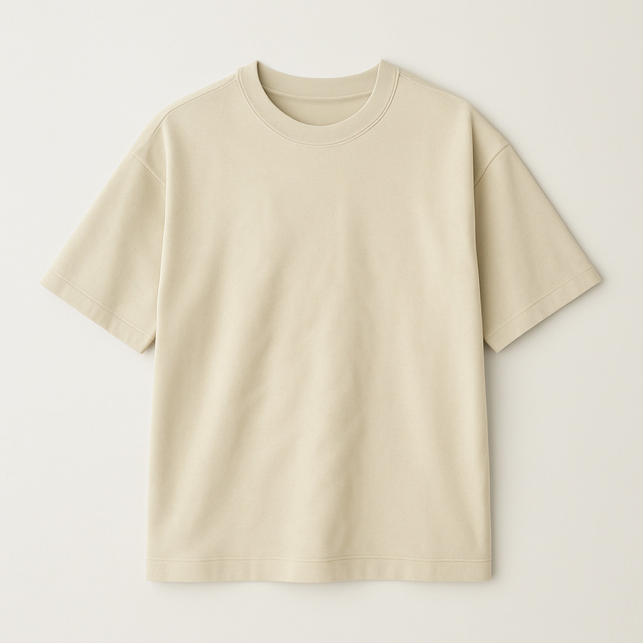 Bej renkli, oversize kesim, üzerine 2 satır istenilen yazının yazılabildiği ve anlık önizleme yapılabilen kişiye özel nakışlı pamuklu unisex tişört.