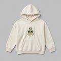 Güneş gözlüğü takan sevimli ananas ve kahverengi tonlarında "LOOKIN' PINE" nakışlı, krem renkli premium polar çocuk hoodie. Oeko-Tex sertifikalı kalın polar kumaş, Alman nakış işçiliği. Eğlenceli ve konforlu çocuk kışlık üst giyim.