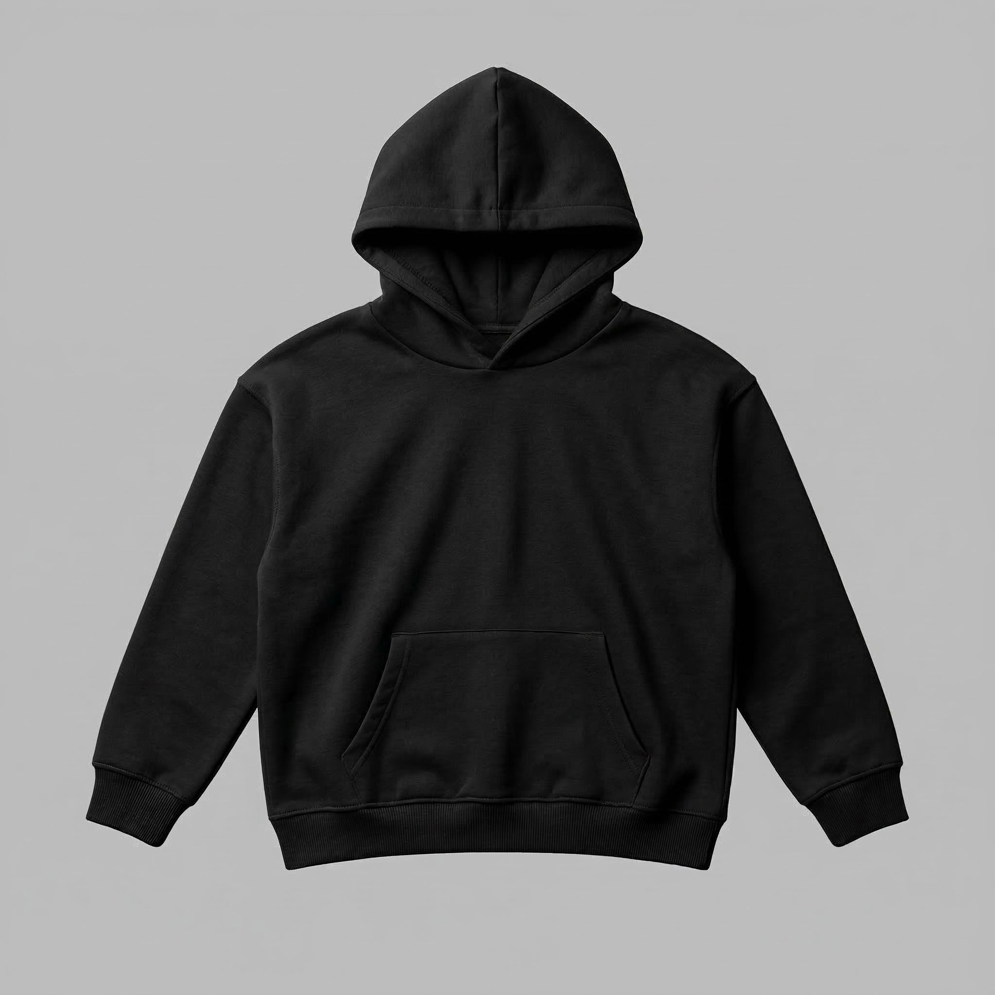 Çocuk giyim tasarımlarınızı mükemmel şekilde yansıtacak siyah renkli boş hoodie mockup görseli. Oeko-Tex standartlarına uygun, içi şardonlu kalın polar kumaşın pürüzsüz dokusunu sergiler. 2-7 yaş çocukları terletmeden sıcak tutan rüzgar kesici yapısı, geniş kanguru cebi ve dayanıklı ribana detayları ile öne çıkar. Kendi nakış veya baskı fikirlerinizi uygulamak, renk seçeneklerinizi müşterilerinize sunmak için ideal premium kapüşonlu sweatshirt matrahıdır.